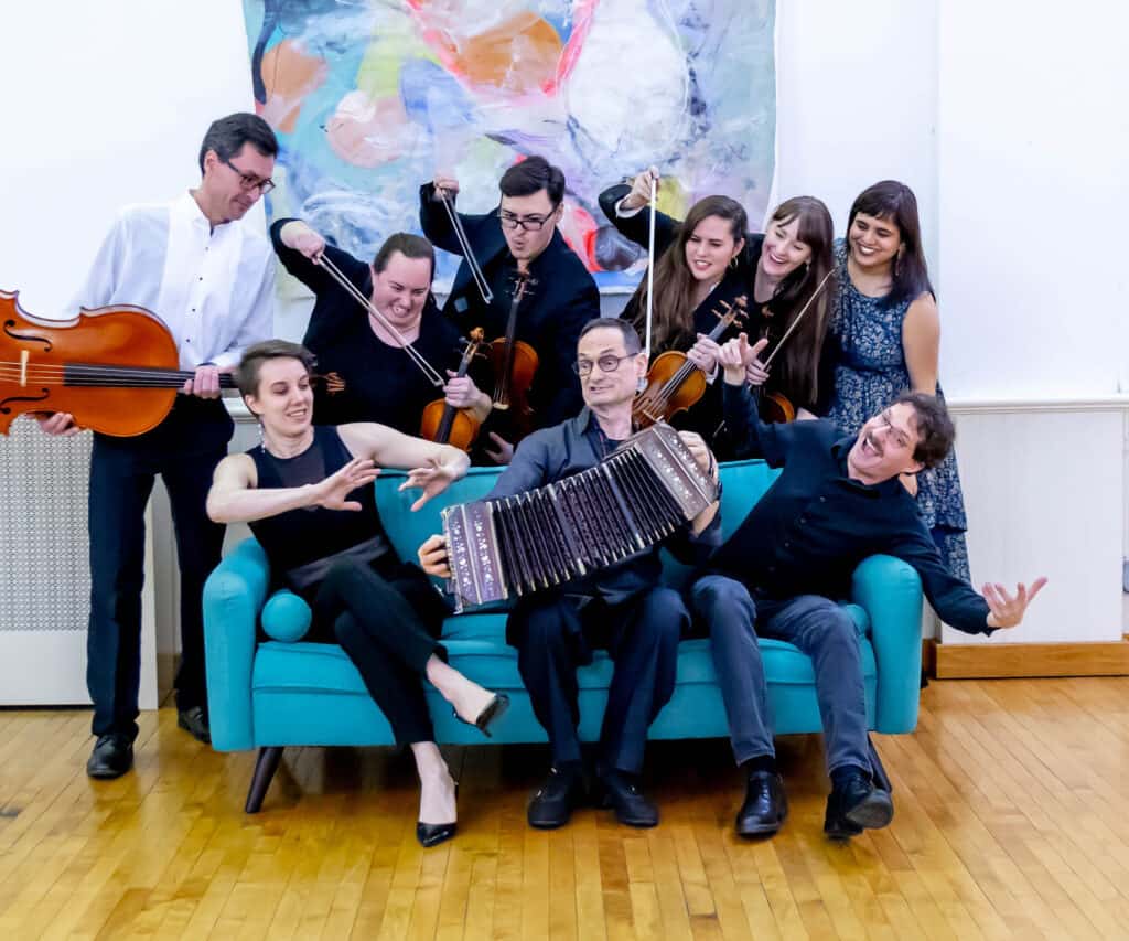 members of Bandoneon Massacre on sofa